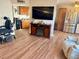 Open living room with stainless steel appliances and hardwood style floors at 4682 Tamalpias Ave, Las Vegas, NV 89120