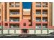Exterior view of building with private garage and main entrance at 55 E Agate Ave # 202, Las Vegas, NV 89123