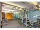 Fully equipped gym with weight machines and mirrored walls at 55 E Agate Ave # 202, Las Vegas, NV 89123