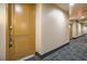 Condo hallway with carpet and secure door at 55 E Agate Ave # 202, Las Vegas, NV 89123