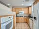 Bright kitchen featuring granite countertops and modern appliances at 55 E Agate Ave # 202, Las Vegas, NV 89123