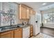 Updated kitchen with granite countertops and stainless steel sink at 55 E Agate Ave # 202, Las Vegas, NV 89123