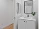 Hall bathroom features a single vanity and modern mirror at 5516 Ness Ave, Las Vegas, NV 89118