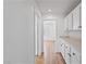 Hallway with hardwood floors and built in cabinets for extra storage at 5516 Ness Ave, Las Vegas, NV 89118