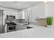 Well-equipped kitchen featuring modern stainless steel appliances and ample counter space at 5516 Ness Ave, Las Vegas, NV 89118