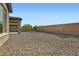 Spacious backyard with low-maintenance desert landscaping at 58 Sun Lily Ln, Henderson, NV 89011