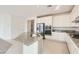 Well-equipped kitchen with island, stainless steel appliances and ample storage at 58 Sun Lily Ln, Henderson, NV 89011