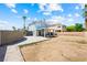 Expansive backyard with covered patio, providing a versatile outdoor space for entertaining and leisure at 5950 Pacific Shores Dr, Las Vegas, NV 89142