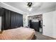Bedroom featuring closet and cozy decor with whimsical wall hangings at 5950 Pacific Shores Dr, Las Vegas, NV 89142