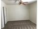 Bedroom with neutral walls, a ceiling fan, and carpeted flooring at 6416 Pronghorn Ridge Ave, Las Vegas, NV 89122