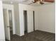 Bedroom with neutral walls, carpeted flooring, and closet with doors at 6416 Pronghorn Ridge Ave, Las Vegas, NV 89122