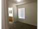 Bedroom with a window and an attached bathroom at 6416 Pronghorn Ridge Ave, Las Vegas, NV 89122
