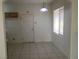Cozy dining area featuring tile floors and a large window at 6416 Pronghorn Ridge Ave, Las Vegas, NV 89122