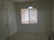 Bright dining area featuring tile floors and natural light at 6416 Pronghorn Ridge Ave, Las Vegas, NV 89122