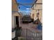 View of backyard featuring gravel, old truck, shed, and air conditioning units at 6429 Rosemount Ave, Las Vegas, NV 89156