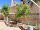 Picture of backyard, showing trees, planter and block wall at 6429 Rosemount Ave, Las Vegas, NV 89156