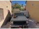 Backyard showing gravel, an old truck, shed, and air conditioning units at 6429 Rosemount Ave, Las Vegas, NV 89156
