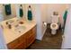 Bathroom featuring a single sink vanity and toilet at 6429 Rosemount Ave, Las Vegas, NV 89156
