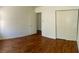 Bedroom with hard wood flooring and white walls at 6429 Rosemount Ave, Las Vegas, NV 89156