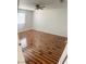 Bedroom featuring wood-look flooring, a window for natural light, and neutral walls at 6429 Rosemount Ave, Las Vegas, NV 89156