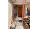 Inviting entryway with a decorative security door and views of a well-maintained yard, plus security system at 6429 Rosemount Ave, Las Vegas, NV 89156