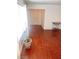 Entryway featuring wood-look floors and a small table with decor at 6429 Rosemount Ave, Las Vegas, NV 89156