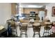 Kitchen features a breakfast bar with seating, modern appliances, and ample counter space at 6429 Rosemount Ave, Las Vegas, NV 89156