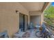 Relax on the balcony with seating and a scenic outdoor view at 8250 N Grand Canyon Dr # 1123, Las Vegas, NV 89166