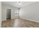 Bedroom with wood flooring, closet, and window at 8250 N Grand Canyon Dr # 1123, Las Vegas, NV 89166