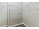 This walk in closet has ample storage thanks to the wire shelving at 8250 N Grand Canyon Dr # 1123, Las Vegas, NV 89166