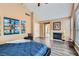 Relaxing main bedroom features a fireplace, vaulted ceilings, and neutral decor at 8320 Opal Cove Dr, Las Vegas, NV 89128