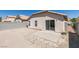 Backyard with a patio and sliding glass door leading into the house at 8877 Perfect Diamond Ct, Las Vegas, NV 89129