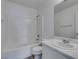 Bathroom with shower-tub combo, white vanity, and large mirror at 8877 Perfect Diamond Ct, Las Vegas, NV 89129