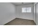 Carpeted bedroom includes a window and closet for storage at 8877 Perfect Diamond Ct, Las Vegas, NV 89129