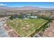 Expansive green sports field in Skye Canyon Park provides ample space for recreational activities at 8898 Sasquatch Run Ave, Las Vegas, NV 89166