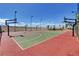 Outdoor basketball court with multiple hoops, well-maintained surface, and scenic views for recreational play at 8898 Sasquatch Run Ave, Las Vegas, NV 89166