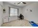 Bedroom with a ceiling fan, work desk, and yoga mat at 8898 Sasquatch Run Ave, Las Vegas, NV 89166