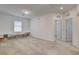 Spacious bonus room with carpet floors and a built in book shelve at 8898 Sasquatch Run Ave, Las Vegas, NV 89166