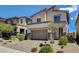 Stunning home with a two-car garage, desert landscaping, and a welcoming entryway at 8898 Sasquatch Run Ave, Las Vegas, NV 89166