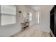 Welcoming entryway with modern decor and natural light from the window at 8898 Sasquatch Run Ave, Las Vegas, NV 89166