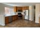 Well-lit kitchen featuring stainless steel appliances and ample cabinet space at 9004 Dulcimer Ln, Las Vegas, NV 89123
