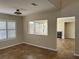 Open floor plan features tile flooring and a decorative passthrough view to the backyard at 9004 Dulcimer Ln, Las Vegas, NV 89123