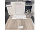 The kitchen's design is highlighted with Elkins White cabinets and Alabaster paint paired with a modern Glade faucet at 9094 Rivington Ave, Las Vegas, NV 89148