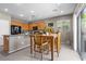 Dining area features an eating area, bright lighting, and wooden table with matching chairs at 9218 Grassy Weep Ct, Las Vegas, NV 89178