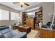 Comfortable living room with bookshelves, a wooden coffee table, and ample seating at 9218 Grassy Weep Ct, Las Vegas, NV 89178