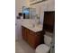 Bathroom featuring a vanity with a single sink, medicine cabinet, and standard toilet at 9312 Yucca Blossom Dr, Las Vegas, NV 89134
