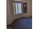 Bedroom with carpet and a bright window at 9312 Yucca Blossom Dr, Las Vegas, NV 89134