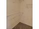 Walk-in closet featuring neutral carpet and wire shelving at 9312 Yucca Blossom Dr, Las Vegas, NV 89134
