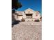 Charming single-story home featuring a two-car garage and a well-maintained gravel yard at 9312 Yucca Blossom Dr, Las Vegas, NV 89134