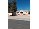 Charming single-story home featuring a two-car garage and a well-maintained gravel yard at 9312 Yucca Blossom Dr, Las Vegas, NV 89134